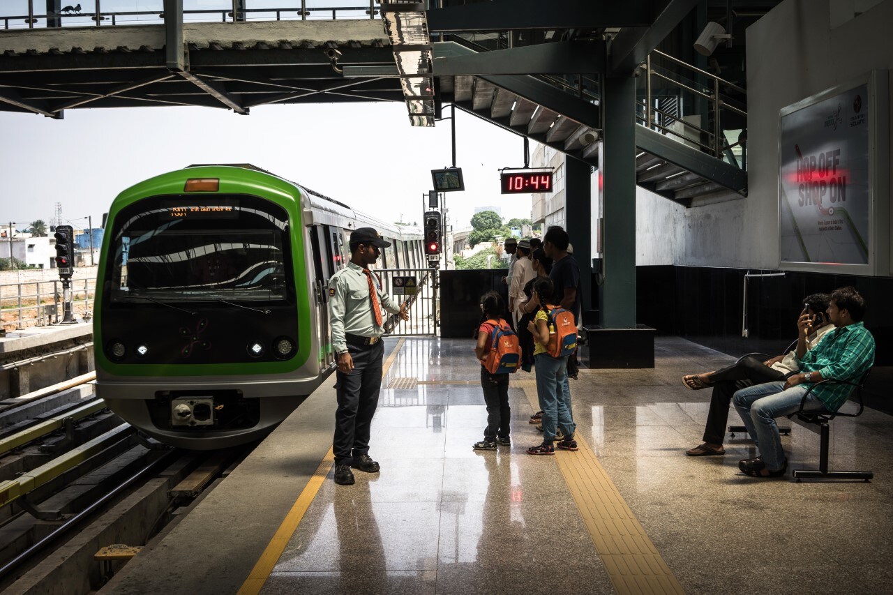 Passengers waiting at a metro station. (Photographer: Sanjit Das/Bloomberg)